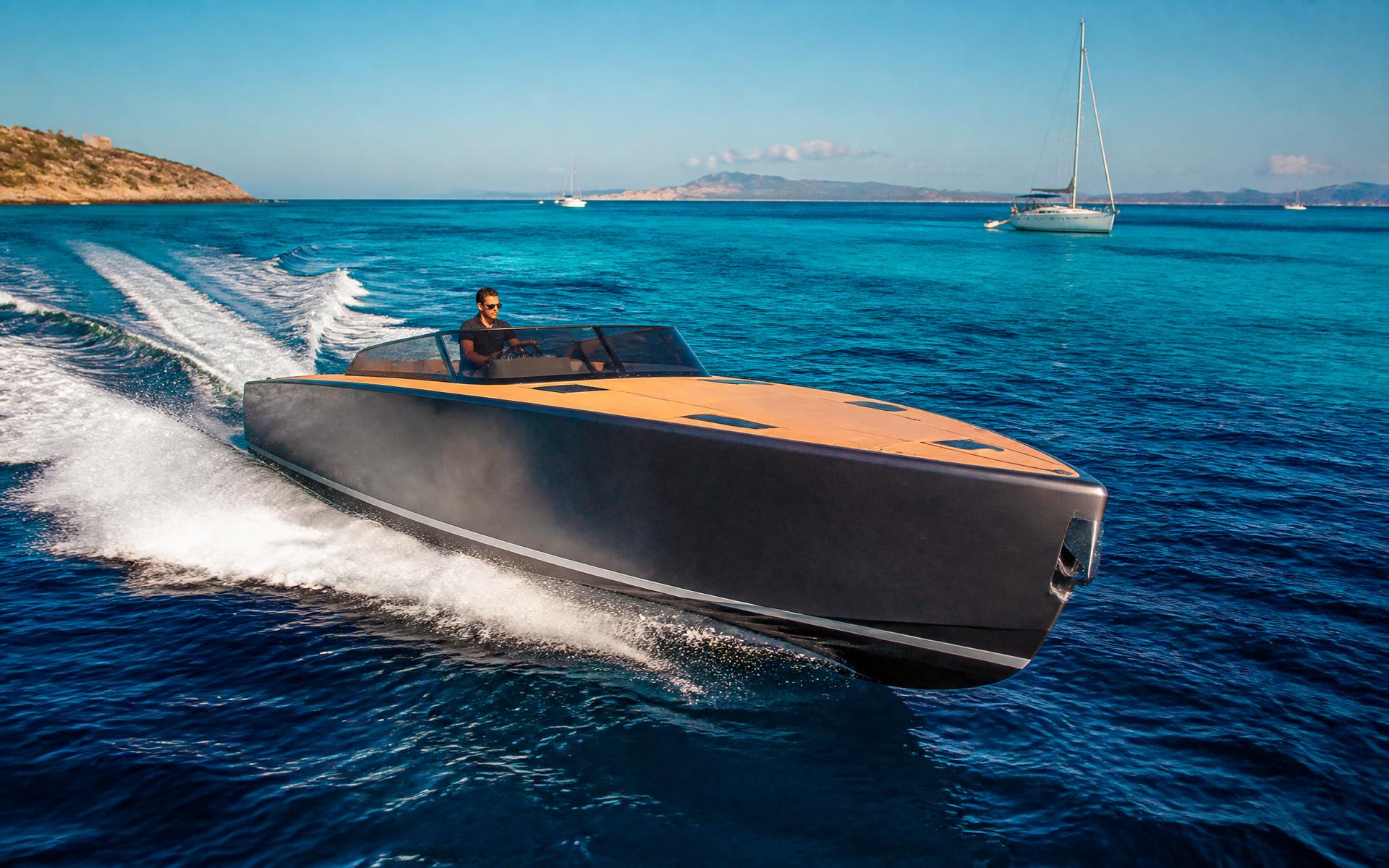 A powerboat running across bright open ocean on a clear day